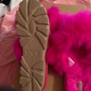 Fabulous hot pink fuzalicuous UGG slides.